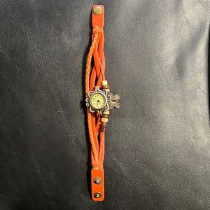 Women’s orange bracelet watch